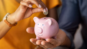 Pink piggy bank symbolizing smart saving strategies for tax refunds and long-term goals. 
